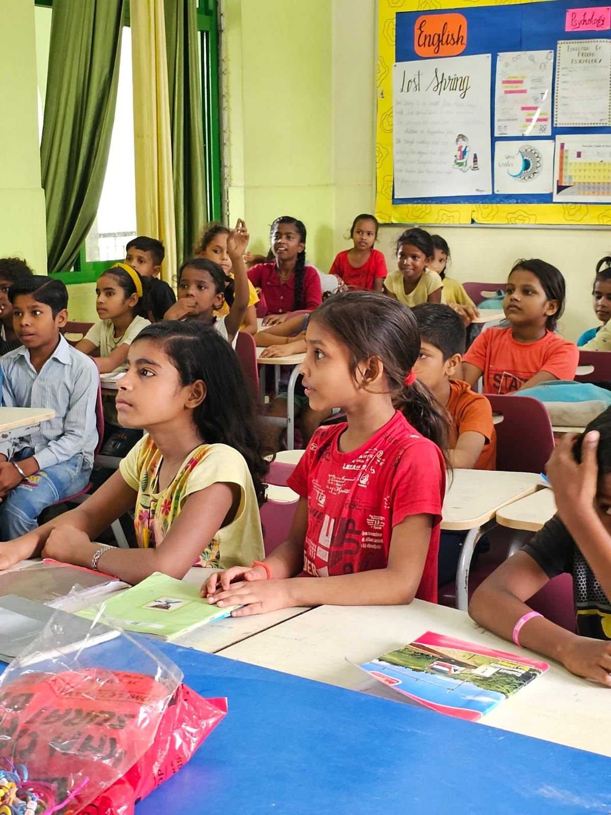 Children in classroom learning together